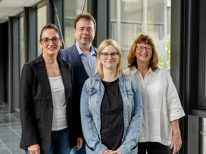 Portraitaufnahme Team Prüfungsbüro